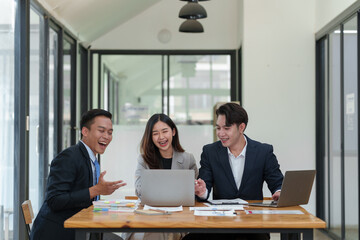 Group of diverse businesspeople brainstorming meeting Ideas, and creative ideas to discuss the situation in the online market working in the office.