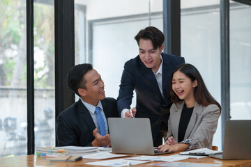 Group of diverse businesspeople brainstorming meeting Ideas, and creative ideas to discuss the situation in the online market working in the office.