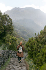 Hikers along summit trail to Pico Ruivo on Madeira Island in Portugal