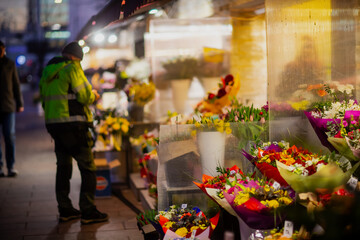 Flower market in evening in city