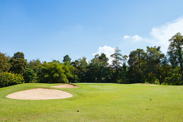 Golf course with blue sky background