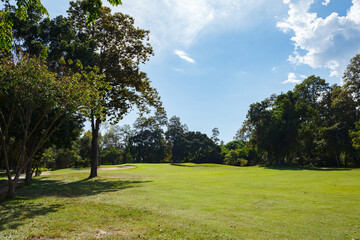 Golf course with blue sky background