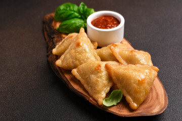 Samosa traditional asian food.Samosa stuffed with meat and spices.