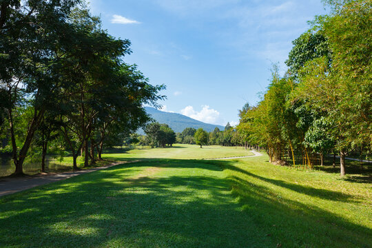Golf course with blue sky background