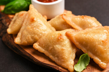 Samosa traditional asian food.Samosa stuffed with meat and spices.