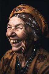 a woman in a headscarf laughing at the camera - obrazy, fototapety, plakaty
