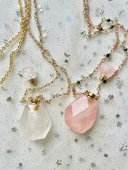 aromatic pendants made of white and pink quartz. crystals for healing. aesthetic photo