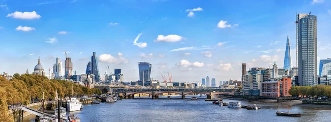 Gordijnen Panorama from Waterloo bridge to river Thames and London City © Valerie2000