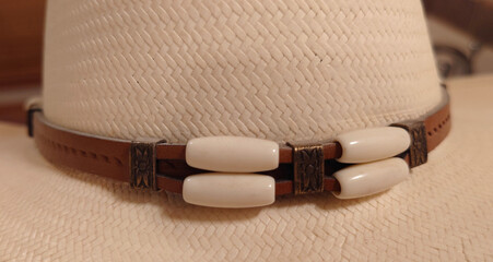 western straw-hat leather hatband with threaded beads decoration - closeup