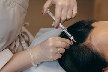 Hair  injection in a beauty salon