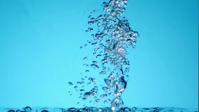 Air bubbles in water on a blue background