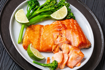 hot smoked salmon with cooked broccoli and lime