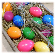 Fototapeta na wymiar color easter eggs in the basket