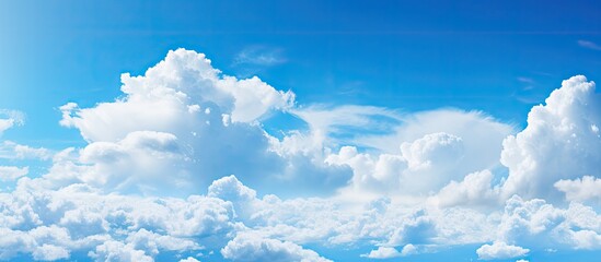 Naklejka na ściany i meble Serene Blue Sky Canvas Painted with Wispy White Clouds, Nature's Tranquil Beauty
