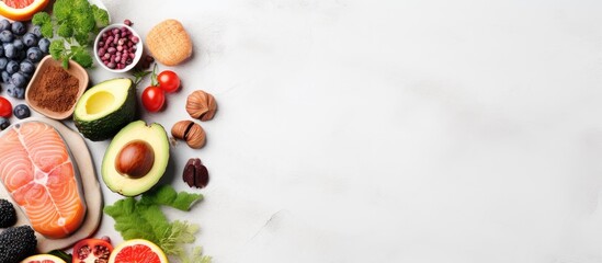 Naklejka na ściany i meble Vibrant Healthy Food Background with Fresh Fruits, Salmon, Avocado, and Nuts for Anti-Aging Benefits