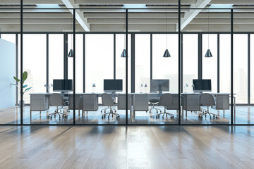Clean warehouse coworking office interior with glass, furniture and daylight. 3D Rendering.