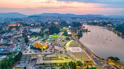 Da Lat, Vietnam - February 21st, 2024: Da Lat city night with urban areas, markets, sparkling hotels, simple transportation system attracts tourists to visit on weekends in Da lat, Vietnam