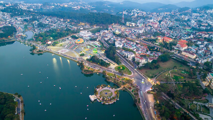 Da Lat, Vietnam - February 21st, 2024: Da Lat city night with urban areas, markets, sparkling hotels, simple transportation system attracts tourists to visit on weekends in Da lat, Vietnam