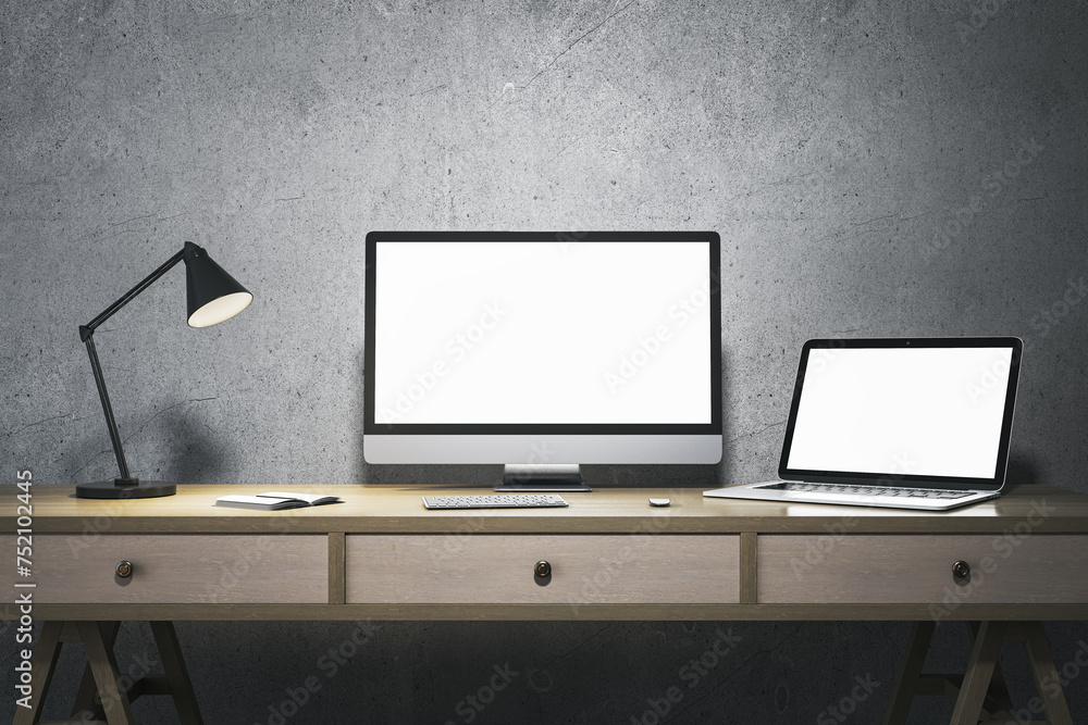 Poster modern minimalistic designer office interior with blank white computer and laptop monitors. mock up,