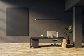 Modern dark home office interior with empty black mock up banner, furniture, wooden flooring and...