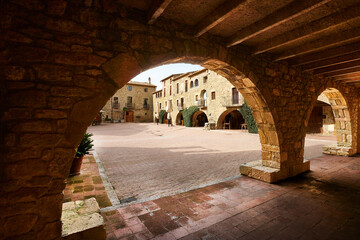 Arcades. Medieval village of Monells. Girona, Costa Brava. Catalunya. Spain