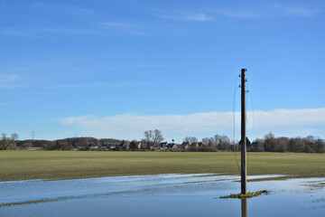 Landschaft mit Strommast