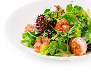 Prawn salad on white plate isolated