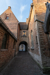 Street in the old town of the beautiful city of Bruges in Belgium, with its historic facades.