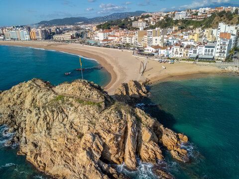 Unlock the beauty of Spain's coastline with our stunning collection of aerial images. From the medieval streets of Blanes to the golden sands of the Mediterranean beaches, our footage transports you t