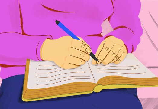 Close up female student with pen reading book
