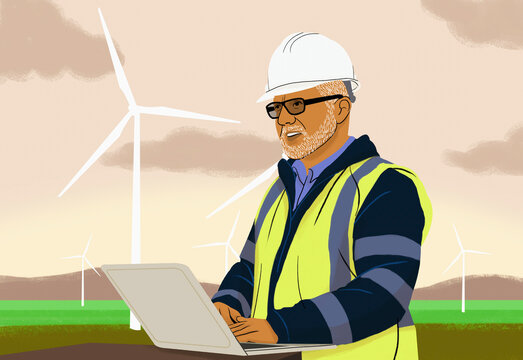 Male engineer with laptop working on wind turbine farm
