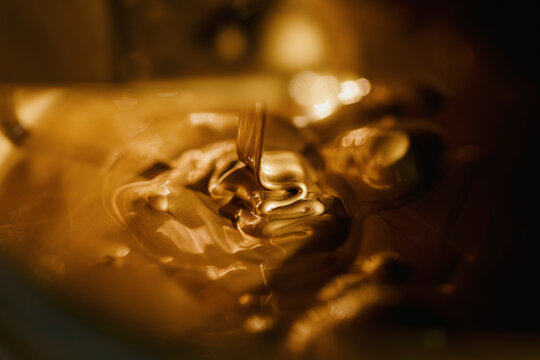 Extreme close up abstract golden printing ink
