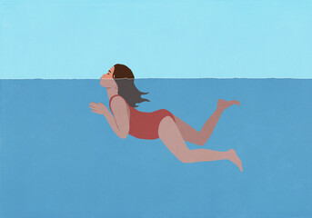 Girl in bathing suit swimming with head above water
