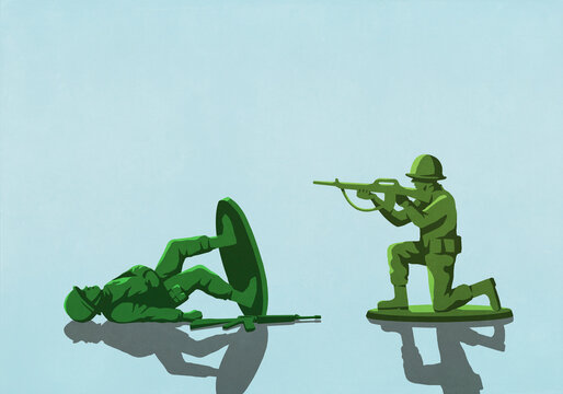 Toy soldier shooting toppled opponent on blue background
