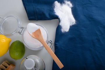 Homemade cleaning sweat stains the armpits on a T-shirt. Eco-friendly cleaning products white...