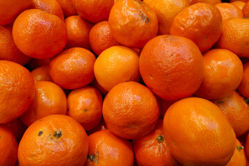 Stack of mandarin oranges on a market stall