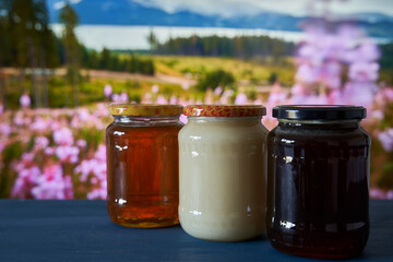 Various honey types in jars
