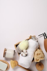 Bath accessories. Different personal care products and cotton flower on white background, flat lay with space for text