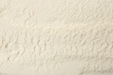 Texture of baking powder as background, top view