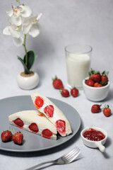 strawberry and vanilla cream  sandwich with blurred foreground and background