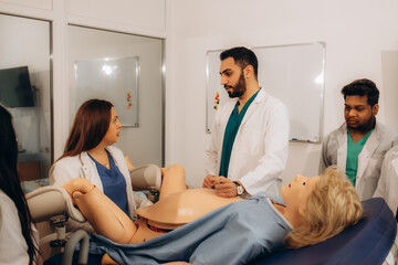 a teacher with a student at a practical childbirth class