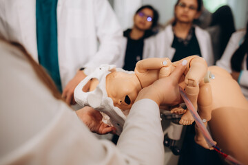 practical training for students to give birth on a mannequin