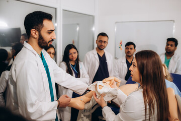 practical training of gynecology students on training obstetrics on a mannequin.
