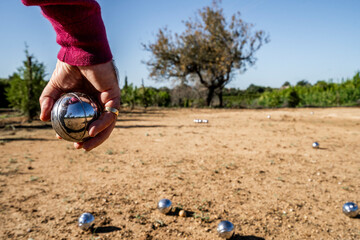 Playing boule in Portugal. - 752156462