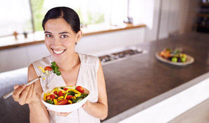 Eating, salad and portrait of woman in kitchen with healthy food for lunch with nutrition in diet. Happy, wellness and hungry vegan person with a smile for fruits, vegetables or benefits to digestion