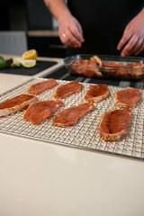 Meat laid out on a grid from a dehydrator