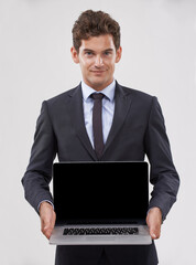 Portrait, screen and man with a laptop, connection and professional on white studio background. Face, person and model with tech, internet or employee with presentation and computer with website info