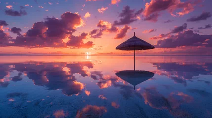 Gordijnen The lonely beach umbrella on the calm water at Sunset © Fauzia