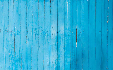Fototapeta na wymiar Texture of blue painted wooden planks, bright barn wall, rustic style