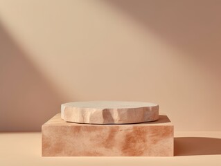 Empty podium made of pink stone for object shooting on beige background